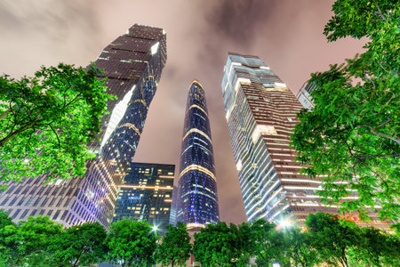 Guangzhou, China - November 7, 2015: Night view of modern buildings at the Zhujiang New Town (the Pearl River New Town) in Guangzhou, China. Beautiful cityscape.のeditorial素材