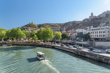 Scenic view of the Kura (Mtkvari) River in Old Town of Tbilisi, Georgia. Tbilisi is a popular tourist destination of the Caucasus region.の写真素材