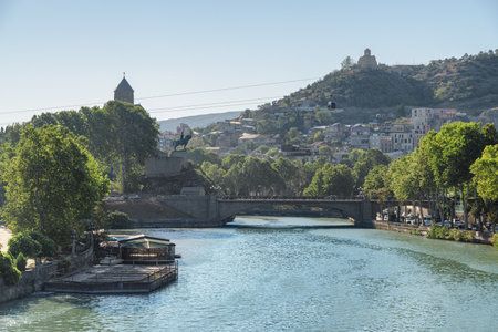 Awesome view of the Virgin Mary Assumption Church of Metekhi and the Metekhi Bridge over the Kura (Mtkvari) River in Old Town of Tbilisi, Georgia. Tbilisi is a popular tourist destination.の写真素材