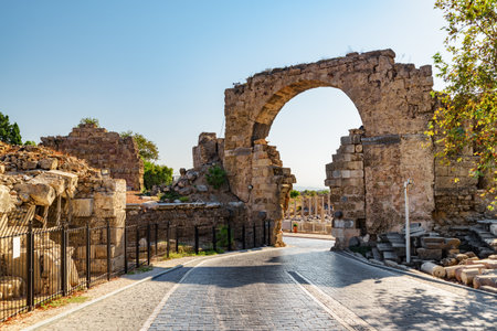 Awesome view of the Vespasian Gate in Side, Turkey. Amazing ruins of the ancient city are a popular tourist attraction of the world.の写真素材