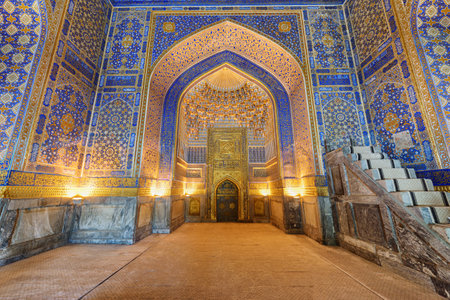 Samarkand, Uzbekistan - September 4, 2022: Inside view of the Tilya-Kori Mosque (Tilla-Kari) at the Registan Square in Samarkand, Uzbekistan. The Registan is a popular tourist attraction of Asia.のeditorial素材