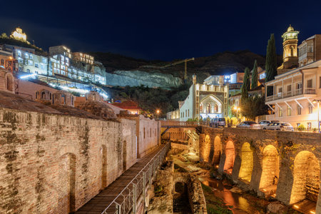 Awesome night view of Leghvtakhevi Gorge (Fig Gorge) in Old Town of Tbilisi, Georgia. The canyon is a popular tourist attraction of the Caucasus region.の写真素材