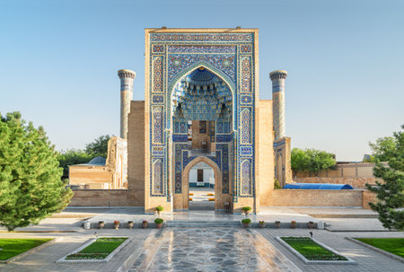 Awesome view of the Gur-e-Amir (Guri Amir) in Samarkand, Uzbekistan. Exterior of mausoleum of the Turco-Mongol conqueror Timur (Tamerlane). The tomb is a popular tourist attraction of Central Asia.の写真素材