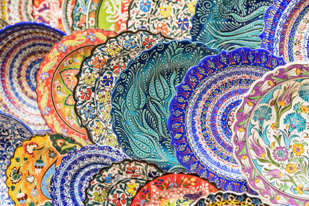 Istanbul, Turkey - September 15, 2021: Plates at the Grand Bazaar. The historical market is a popular tourist destination and one of the largest and oldest markets in the world.のeditorial素材