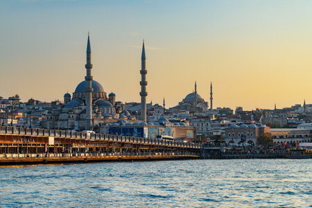Istanbul, Turkey - November 1, 2021: Scenic evening view of the Galata Bridge over the Golden Horn and the New Mosque (the Valide Sultan Mosque). Awesome Istanbul skyline.のeditorial素材