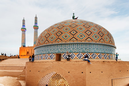 Yazd, Iran - 27 October, 2018: Amazing evening view of dome and minarets of the Jameh Mosque of Yazd. Azari style of Persian Islamic architecture.のeditorial素材