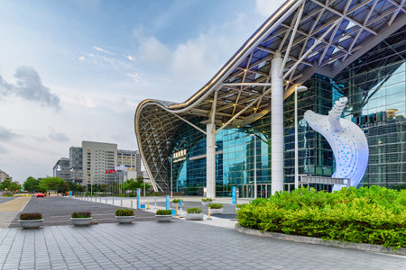 Kaohsiung, Taiwan - April 30, 2019: Awesome evening view of the Kaohsiung Exhibition Center at downtown. Kaohsiung is a popular tourist destination of Asia.のeditorial素材