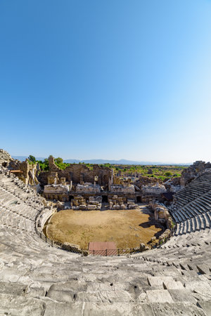 View of the ancient theatre in Side, Turkey. Side is a popular tourist destination in Turkey.の写真素材