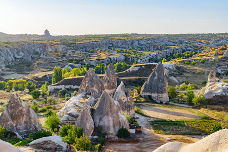 Awesome view of rock formations called the Fairy Chimneys in Cappadocia, Turkey. Fabulous landscape of Goreme Historical National Park. Cappadocia is a popular tourist destination of Turkey.の写真素材