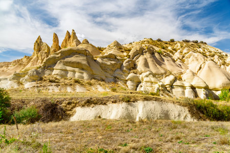 Awesome view of rock formations in the Love valley in Cappadocia, Turkey. Fabulous landscape of Goreme Historical National Park. Cappadocia is a popular tourist destination of Turkey.の写真素材