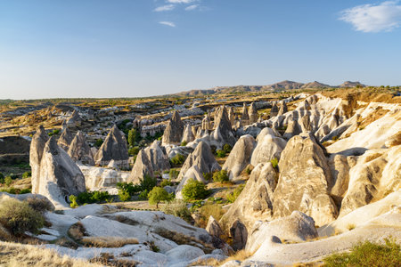Awesome view of rock formations called the Fairy Chimneys in Cappadocia, Turkey. Fabulous landscape of Goreme Historical National Park. Cappadocia is a popular tourist destination of Turkey.の写真素材