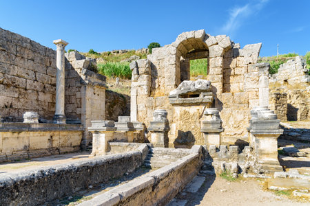 Scenic ruins of the nymphaeum (nymphaion) in Perge (Perga) at Antalya Province, Turkey. Awesome view of the ancient Greek city. Perge is a popular tourist destination in Turkey.の写真素材