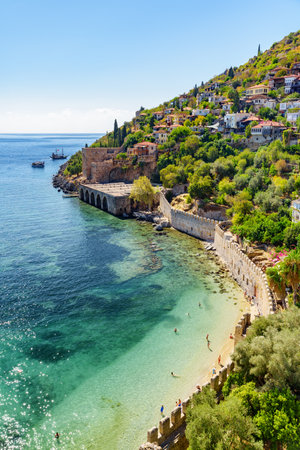 Awesome view of the Tersane and boats by the coast of Alanya, Turkey. Amazing coastline. The ancient shipyard is a popular tourist attraction in Turkey.の写真素材