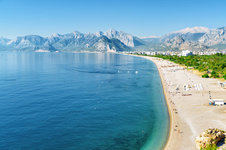 Awesome view of Konyaalti Beach and Park in Antalya, Turkey. Drone flying over the beach. Konyaalti Beach is a popular tourist attraction in Turkey.の写真素材