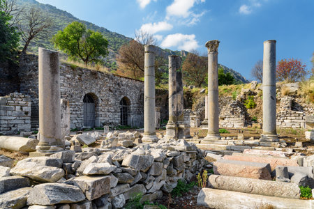 Scenic ruins of the agora in Ephesus (Efes) at Selcuk in Izmir Province, Turkey. Awesome view of the ancient Greek city. Ephesus is a popular tourist destination in Turkey.の写真素材
