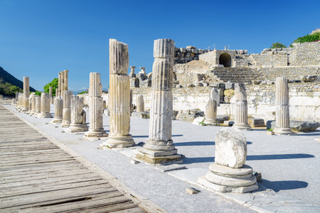 Awesome view of columns in Ephesus (Efes) at Selcuk in Izmir Province, Turkey. Scenic ruins of the ancient Greek city. Ephesus is a popular tourist attraction in Turkey.の写真素材