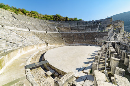 The Theatre of Ephesus (Efes) at Selcuk in Izmir Province, Turkey. The amphitheatre is the largest in the ancient world for gladiatorial combats and drama. Ephesus is a popular tourist destination.の写真素材