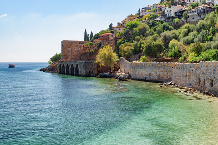 Awesome view of the Tersane and the beach by the coast of Alanya, Turkey. Amazing coastline. The ancient shipyard is a popular tourist attraction in Turkey.の写真素材