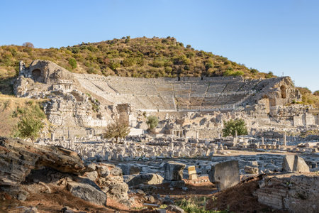 The Theatre of Ephesus (Efes) at Selcuk in Izmir Province, Turkey. The amphitheatre is the largest in the ancient world for gladiatorial combats and drama. Ephesus is a popular tourist destination.の写真素材
