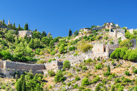 Awesome view of fortress walls of Alanya Castle in Turkey. The medieval castle is a popular tourist attraction in Turkey.の写真素材