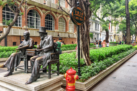 Guangzhou, China - November 7, 2015: Sculptures in public garden on Shamian Island. Guangzhou is a popular tourist destination of Asia.のeditorial素材