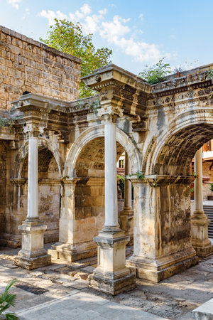 Awesome view of Hadrian's Gate (Uckapilar) in Kaleici of Antalya, Turkey. The Kaleici area is the historic city center and a popular tourist attraction in Turkey.の写真素材