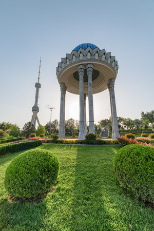 Awesome view of scenic rotunda at the Memorial Shakhidlar Hotirasi complex (Memories of victims of political repression) in Tashkent, Uzbekistan. Tashkent TV Tower is visible at left side.のeditorial素材