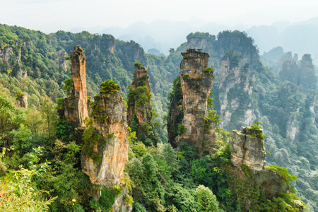 Awesome view of natural quartz sandstone pillars of the Tianzi Mountains (Avatar Mountains) in the Zhangjiajie National Forest Park, Hunan Province, China. Fabulous landscape.の写真素材