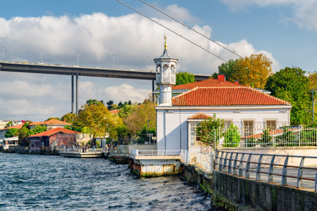 Scenic view of Uryanizade Ahmet Esat Efendi Mosque by the Bosporus. The Bosphorus Bridge (the 15 July Martyrs Bridge) is visible on background.の写真素材