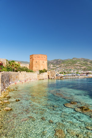 Awesome view of the Kizil Kule by the Mediterranean Sea in Alanya, Turkey. The Red Tower is a popular tourist attraction in Turkey.の写真素材