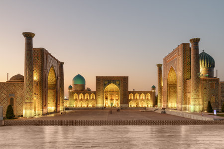 Evening view of the Registan Square in Samarkand, Uzbekistan. The Ulugh Beg Madrasah, the Tilya-Kori Madrasah and the Sher-Dor Madrasah. The Registan is a popular tourist attraction of Central Asia.のeditorial素材