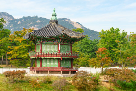 Colorful autumn view of Hyangwonjeong Pavilion at Gyeongbokgung Palace in Seoul, South Korea. Awesome pavilion of traditional Korean architecture.のeditorial素材