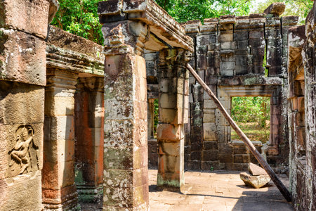 Mysterious ruins of Ta Prohm temple in ancient Angkor, Siem Reap, Cambodia. Angkor is a popular tourist attraction.の写真素材