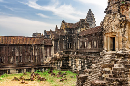 View of ancient temple complex Angkor Wat in Siem Reap, Cambodia. Angkor Wat is a popular tourist attraction.の写真素材