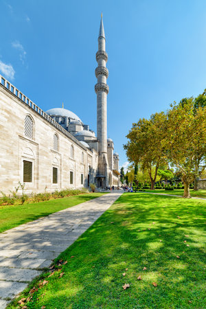 Awesome view of scenic gardens of the Suleymaniye Mosque in Istanbul, Turkey. The Ottoman imperial mosque is a popular destination among pilgrims and tourists of the world.の写真素材
