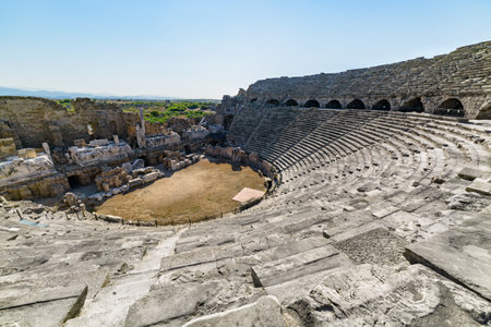 View of the ancient theatre in Side, Turkey. Side is a popular tourist destination in Turkey.の写真素材