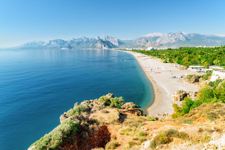 Awesome view of Konyaalti Beach and Park in Antalya, Turkey. Drone flying over the beach. Konyaalti Beach is a popular tourist attraction in Turkey.の写真素材