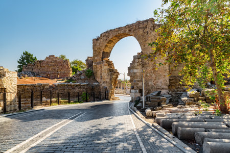 Awesome view of the Vespasian Gate in Side, Turkey. Amazing ruins of the ancient city are a popular tourist attraction of the world.の写真素材
