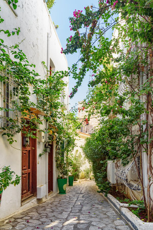 Awesome view of a cozy narrow street in Marmaris, Turkey. Scenic white houses of the old town. The port city is a popular tourist destination in the Turkish Riviera.の写真素材