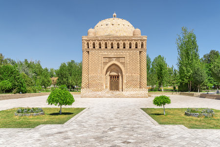 Awesome view of the Samanid Mausoleum in Bukhara, Uzbekistan. The ancient building is the only surviving monument from the Samanid era. Bukhara is a popular tourist attraction of Central Asia.の写真素材