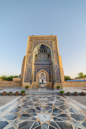 Awesome view of the Gur-e-Amir (Guri Amir) in Samarkand, Uzbekistan. Exterior of mausoleum of the Turco-Mongol conqueror Timur (Tamerlane). The tomb is a popular tourist attraction of Central Asia.の写真素材
