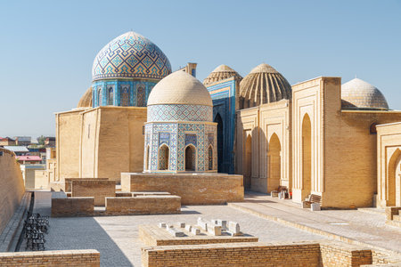 Awesome view of the Shah-i-Zinda Ensemble in Samarkand, Uzbekistan. Mausoleums decorated by blue tiles with designs. The necropolis is a popular tourist attraction of Central Asia.の写真素材