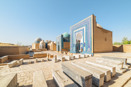 Awesome view of the Shah-i-Zinda Ensemble in Samarkand, Uzbekistan. Mausoleums decorated by blue tiles with designs. The necropolis is a popular tourist attraction of Central Asia.の写真素材
