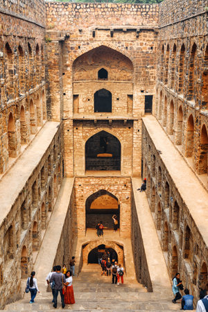 Delhi, India - 5 November, 2018: Amazing view of Agrasen ki Baoli reservoir. The ancient step well is a popular tourist attraction of South Asia. Awesome historical monument with arched niches.のeditorial素材