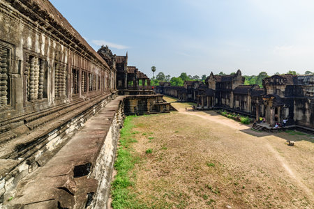 View of ancient temple complex Angkor Wat in Siem Reap, Cambodia. Angkor Wat is a popular tourist attraction.の写真素材
