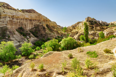 Awesome view of rock formations in the Pigeon valley in Cappadocia, Turkey. Fabulous landscape of Goreme Historical National Park. Cappadocia is a popular tourist destination of Turkey.の写真素材