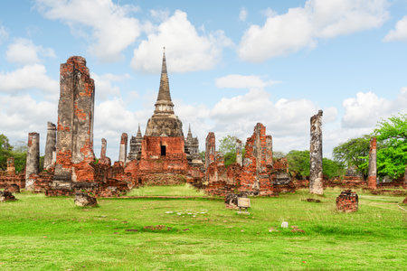 Scenic ruins of Wat Phra Si Sanphet in Ayutthaya, Thailand. Amazing view of the Buddhist temple in the ancient city of the Ayutthaya Kingdom (Siam). Thailand is a popular tourist destination of Asia.の写真素材