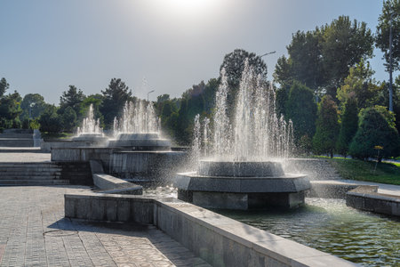 Awesome view of wonderful fountains at Registan Street in Samarkand, Uzbekistan. Samarkand is a popular tourist destination of Central Asia.の写真素材