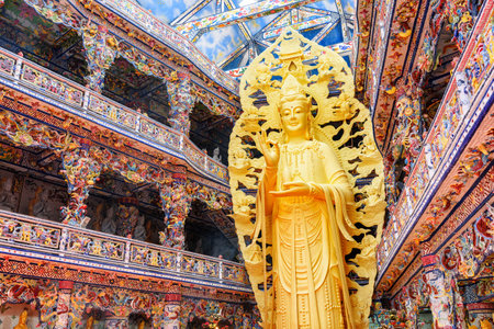Da Lat, Vietnam - March 20, 2015: Golden Buddha statue in the Linh Phuoc Pagoda in Da Lat city (Dalat), Vietnam. Da Lat is a popular tourist destination of Asia.のeditorial素材
