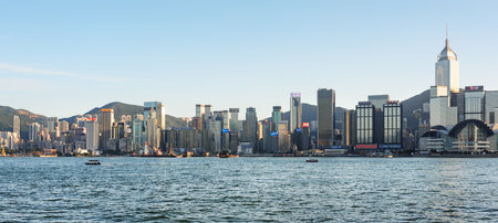 Hong Kong - November 8, 2015: View of Hong Kong Island skyline across Victoria harbor. Amazing cityscape. Hong Kong is a popular tourist destination of Asia.のeditorial素材
